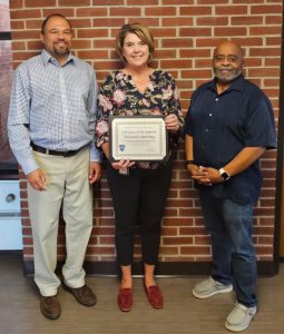 Vicki Sterling, center, was named Employee of the Quarter at the Washington County Health Department for the fourth quarter of FY24. Presenting the award is Earl Stoner, health officer, left and David Washington, coordinator of harm reduction, right.