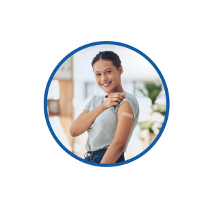 Person showing band-aid on arm following an immunization.